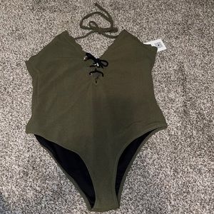 Green one piece swim suit